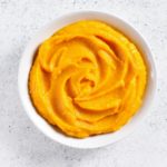 Image of pumpkin puree in white bowl for use in healthy pumpkin gnocchi recipe ppma